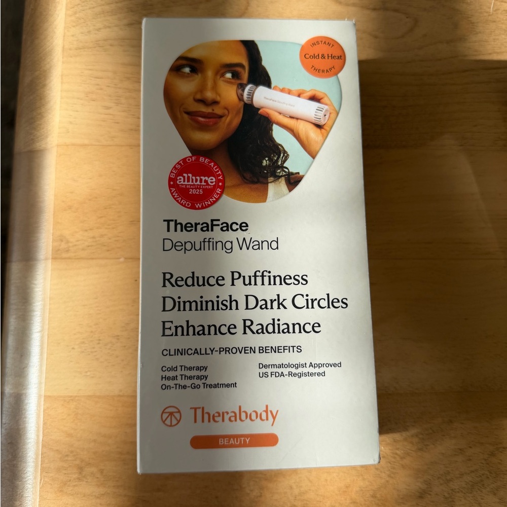 Therabody TheraFace Depuffing Wand - White and Orange